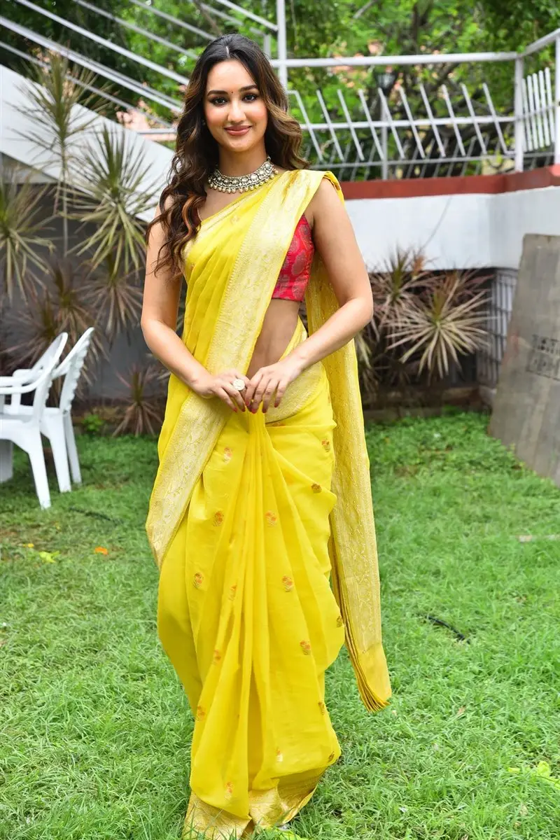 Akanksha Sharma Yellow Saree Red Sleeveless Blouse